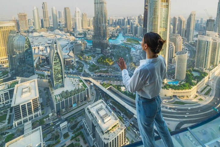 Experience breathtaking views from the Burj Khalifa witnessing Dubai’s skyline and architectural marvels from an exhilarating height creating unforgettable memories against a stunning backdrop.